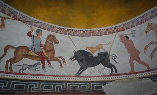 Образът на владетеля, яздещ червен кон, атакуващ глиган, който символизира хаоса и злото